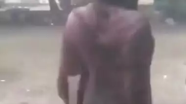 Desi Bhabhi in REsort Dancing in Rain showing her boobs