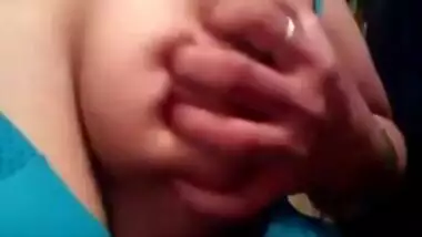It is a solo porn video where Desi lady with nose piercing shows boobs