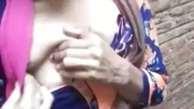 Adorable Desi cutie flashes curious friend her XXX tits in public