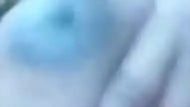 Slut exposes natural tits with dark nipples for XXX online Desi lover