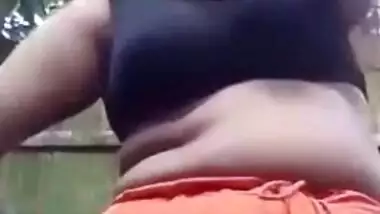 Desi takes outdoor shower and gets dressed in outdoor XXX self-tape