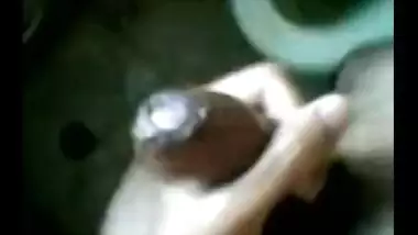 Boy alone in bathroom putting oil his cock and musterbating with the load of cum