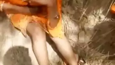 Man watches Desi girlfriend in orange sari taking pants off for XXX video