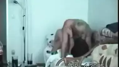 Young indian girl teaching indian how to wear a...