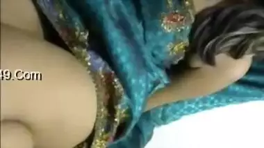 Solo Indian babe in a luxurious dress is excited so she touches tits