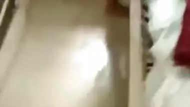 After sex Desi goes to the bathroom to wash her main XXX parts