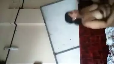 Indian sex movie scene of a older pair enjoying a home sex session