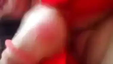 Plump amateur Desi wife in a red sari performs hot XXX striptease